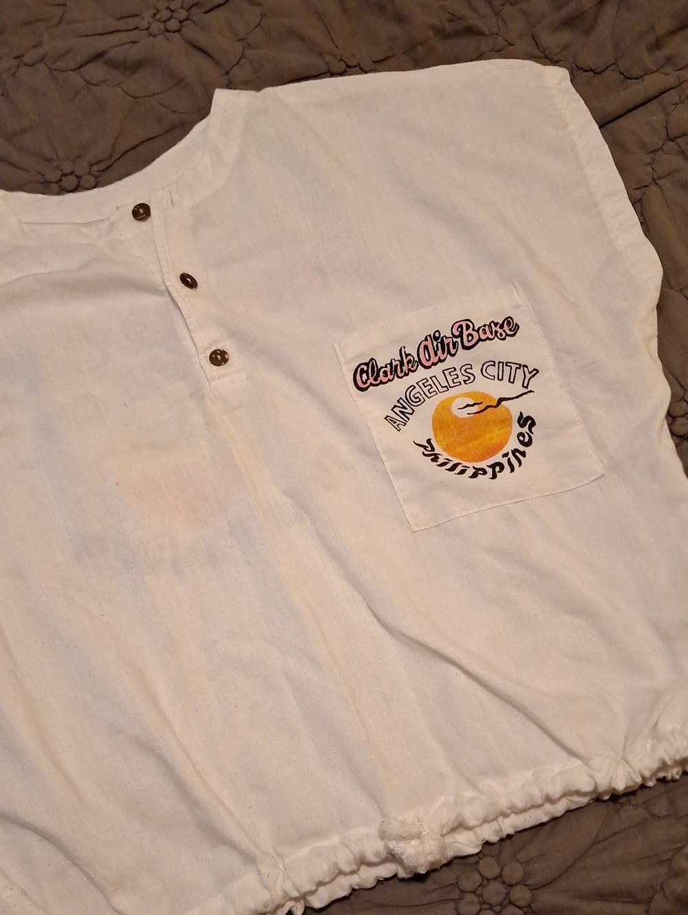 White Pocket Tee with 'Clark Air Base' Graphic